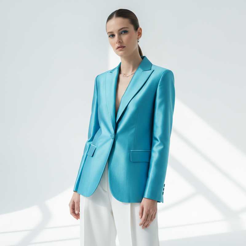 Model in Tiffany Blue satin blazer representing summer 2026 fashion color trend